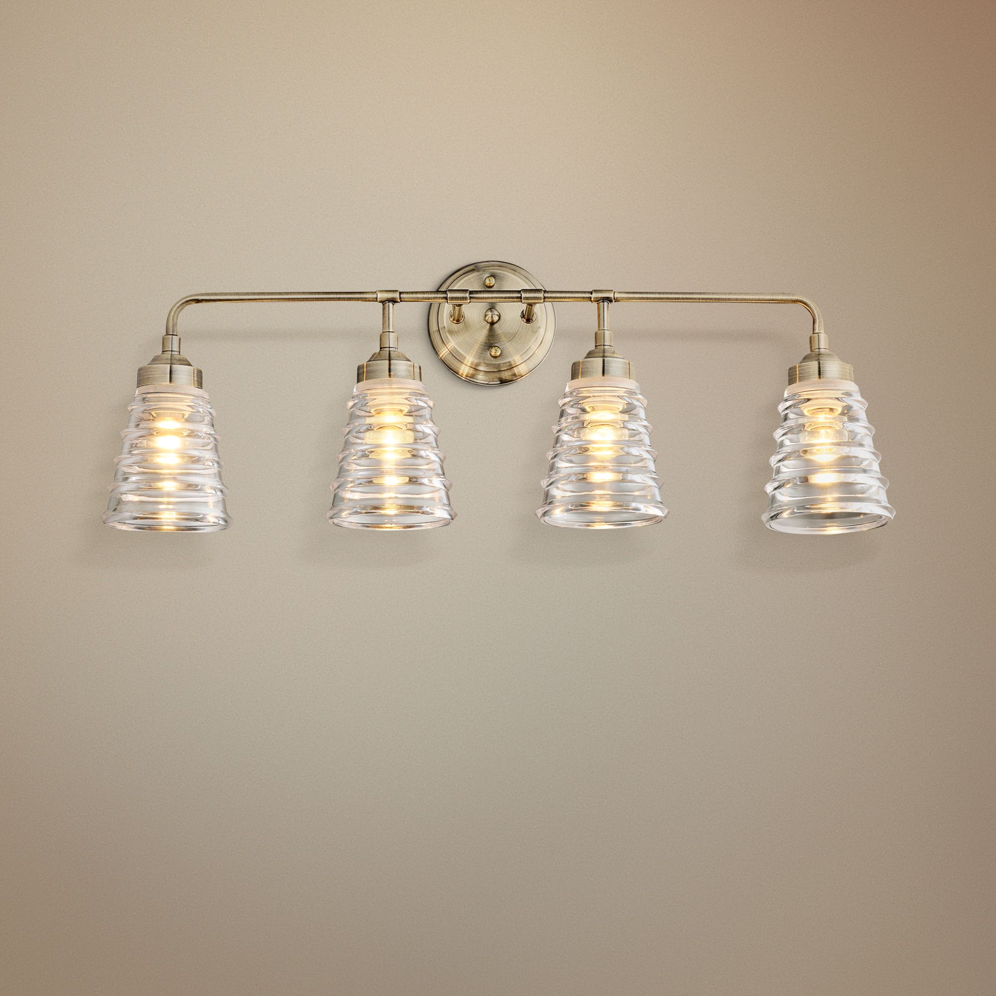 Varaluz Amherst 29" Wide 4-Light Antique Brass Bath Light