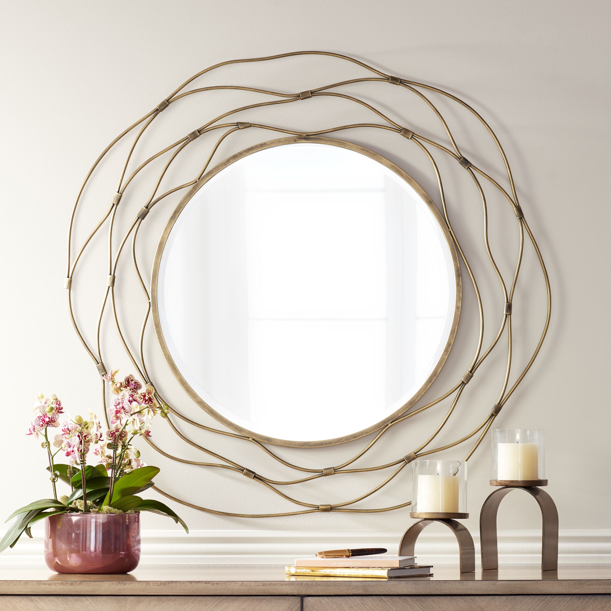 Trina Antique Gold 37" Metal Wave Openwork Wall Mirror