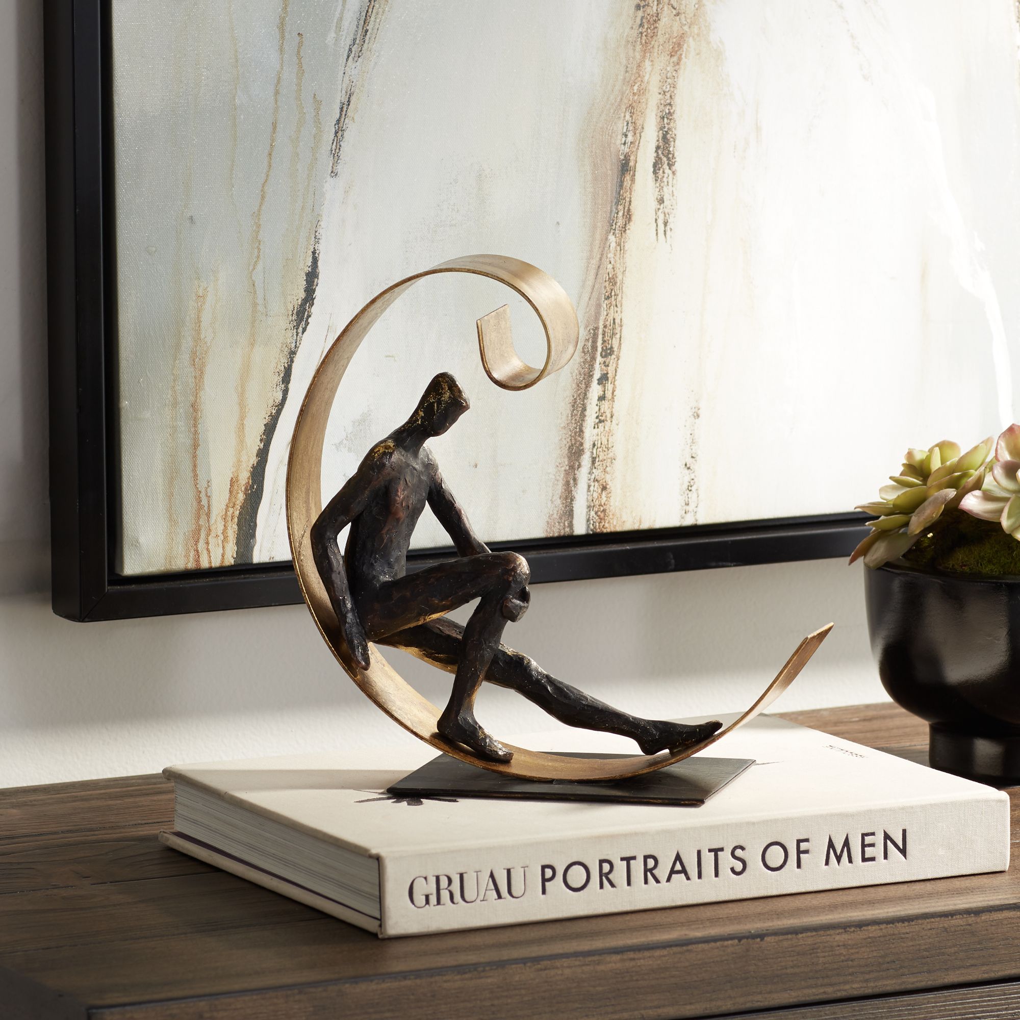 Man Relaxing In Semi Circle 9 1/2"H Copper and Gold Statue