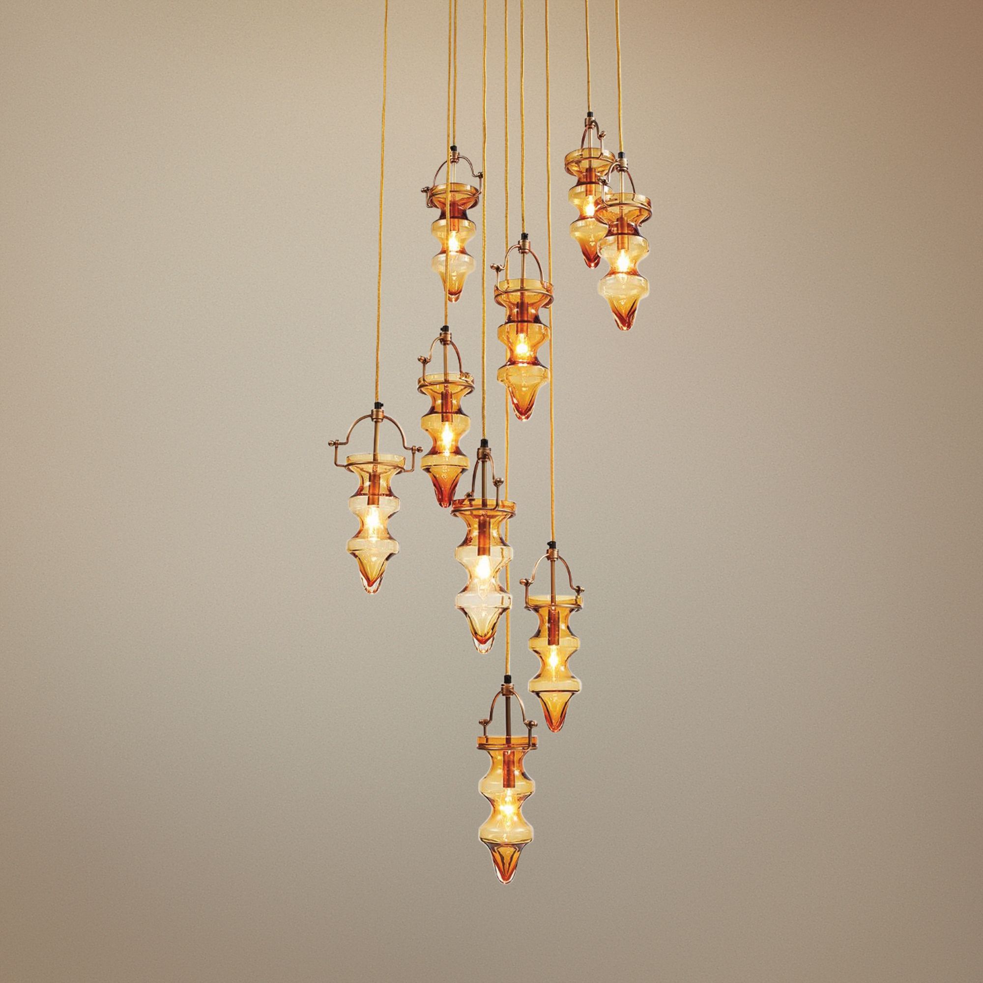 Tea Light 24"W Antique Brass and Amber Multi Pendant