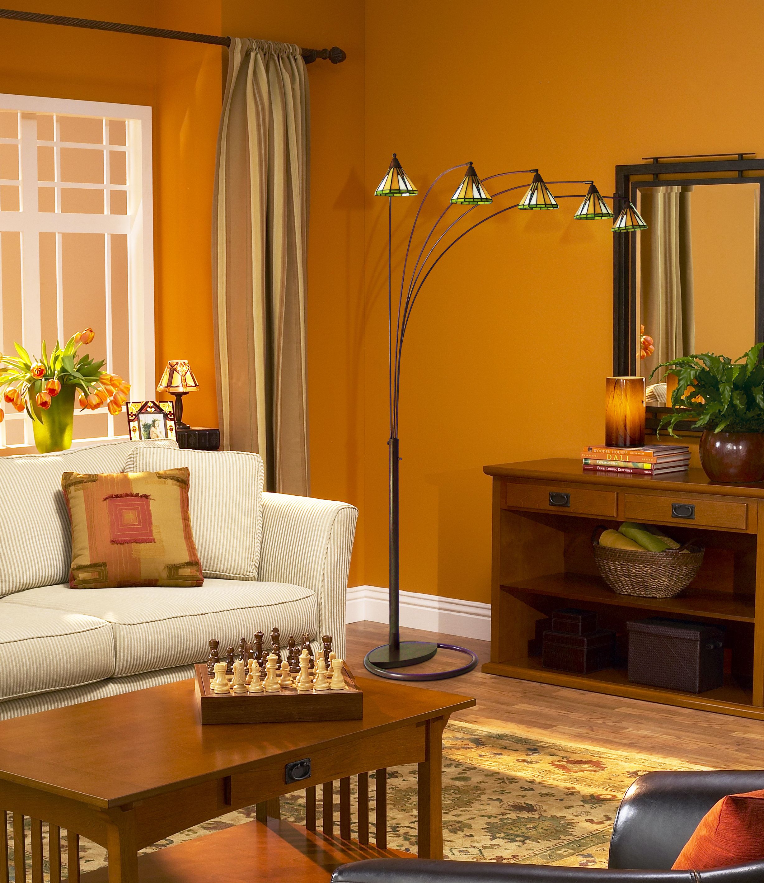 Use an Arc Floor Lamp to brighten a dark room corner. Lamps Plus