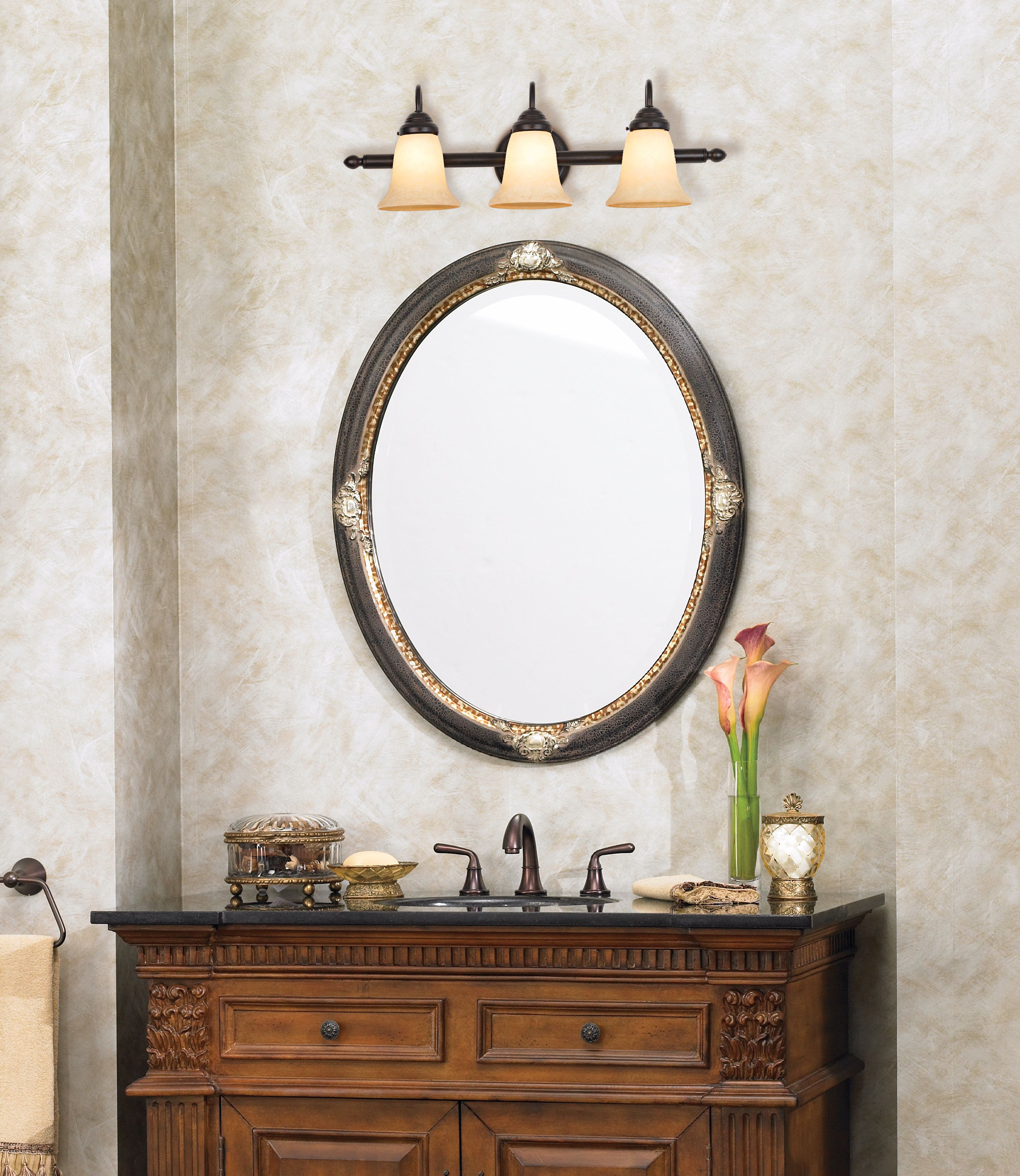 Add accents to a vanity tabletop to accessorize your bathroom. Lamps Plus
