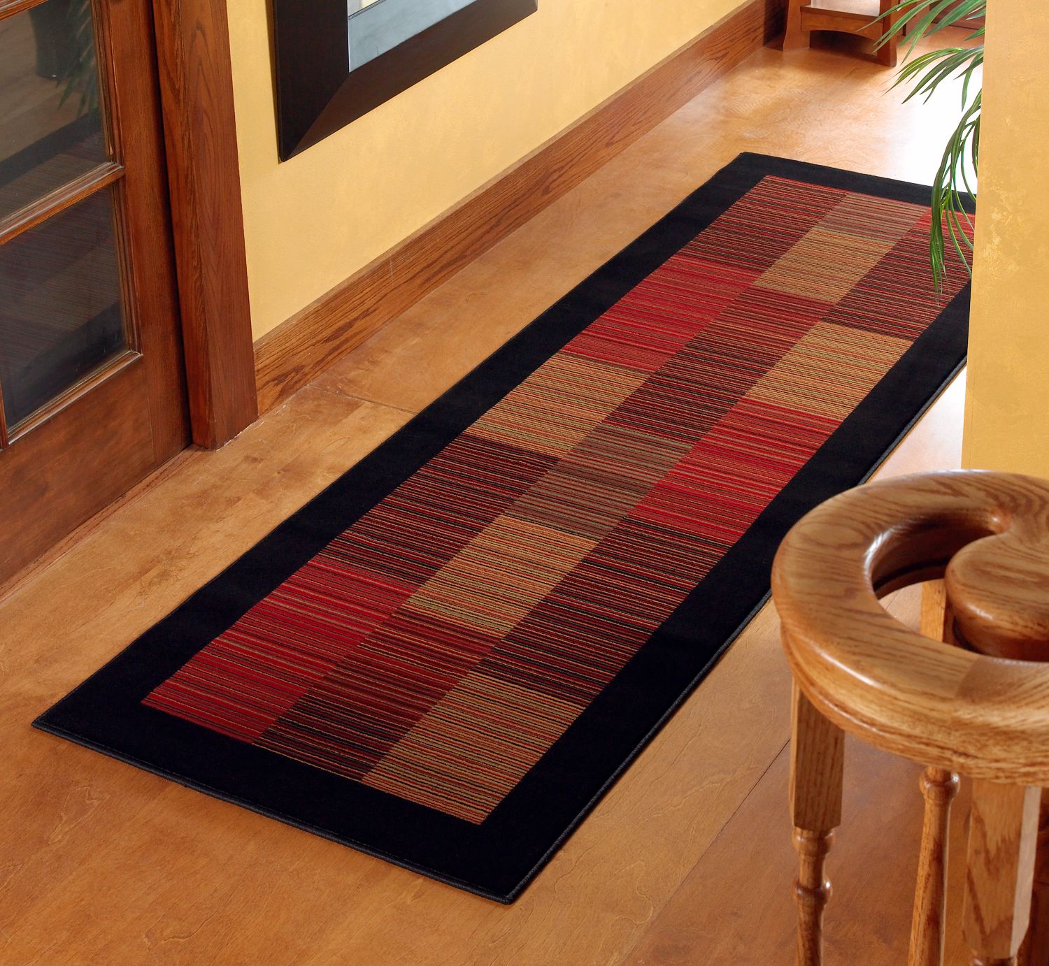 Make a hallway entryway warm and with a floor runner rug