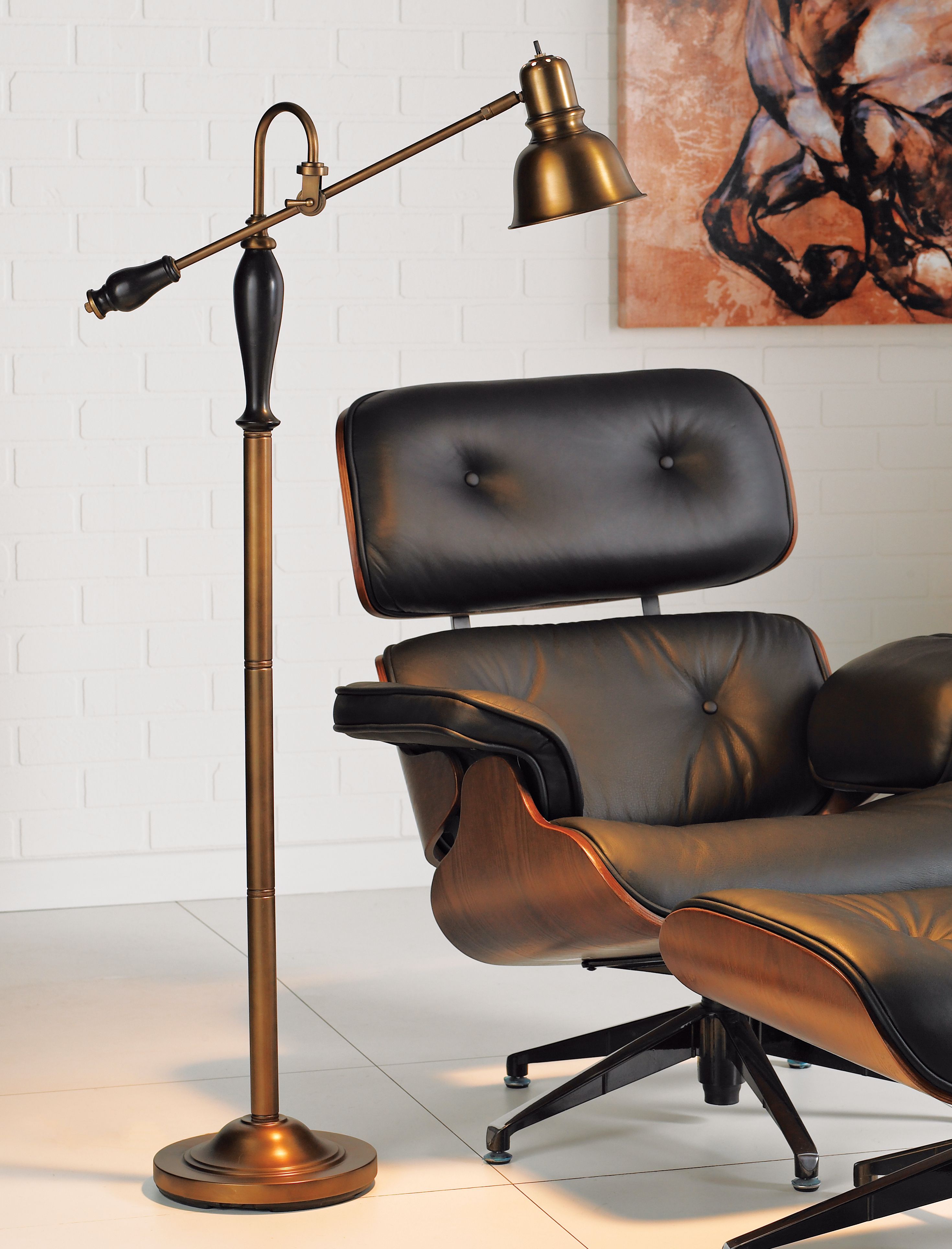 An adjustable floor lamp and a modern arm chair make the perfect pair