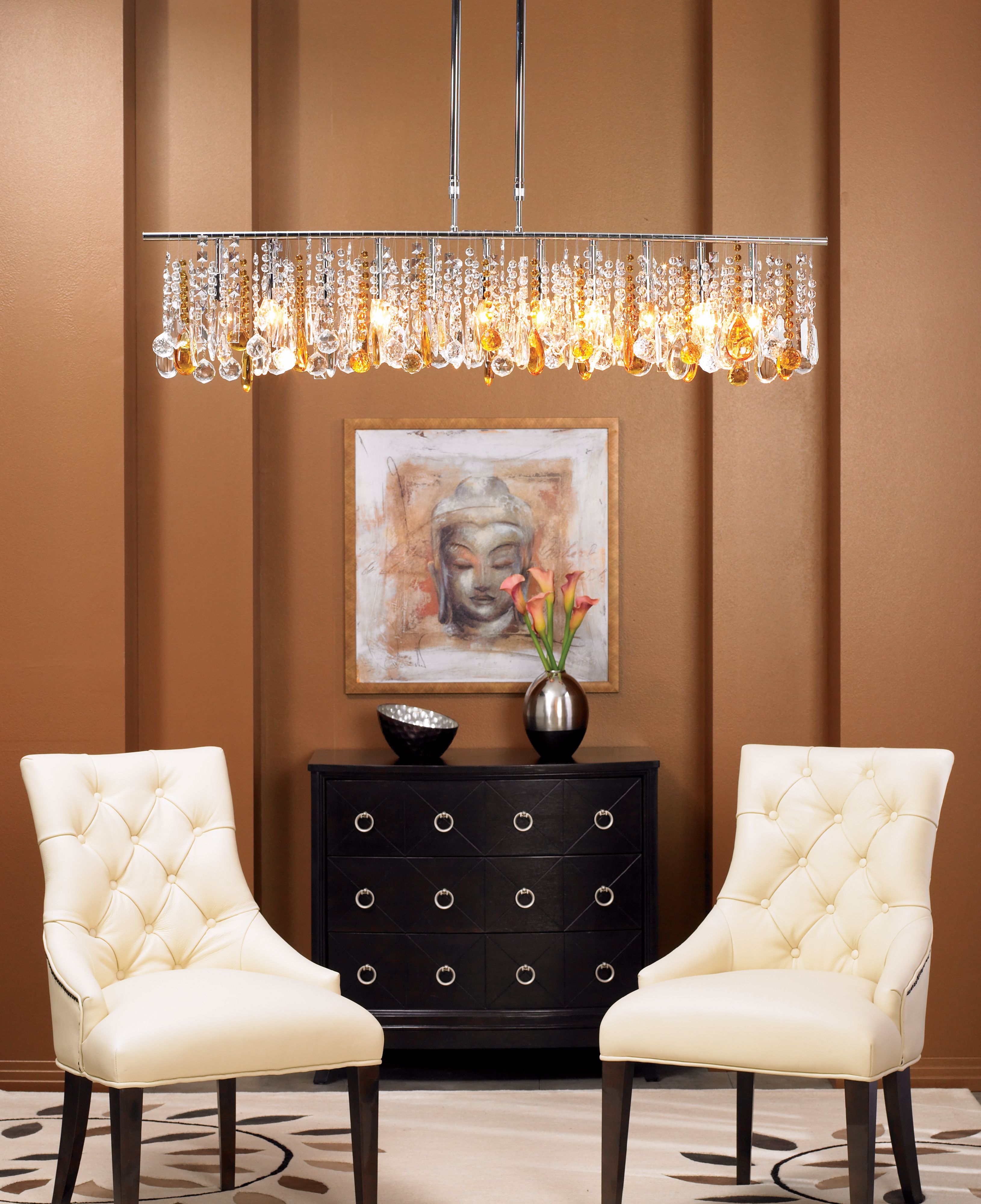 A large modern chandelier creates a living room with modern style
