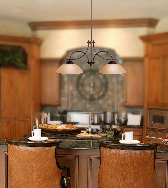 Kicheler pendant lighting over a kitchen bar area. Lamps Plus