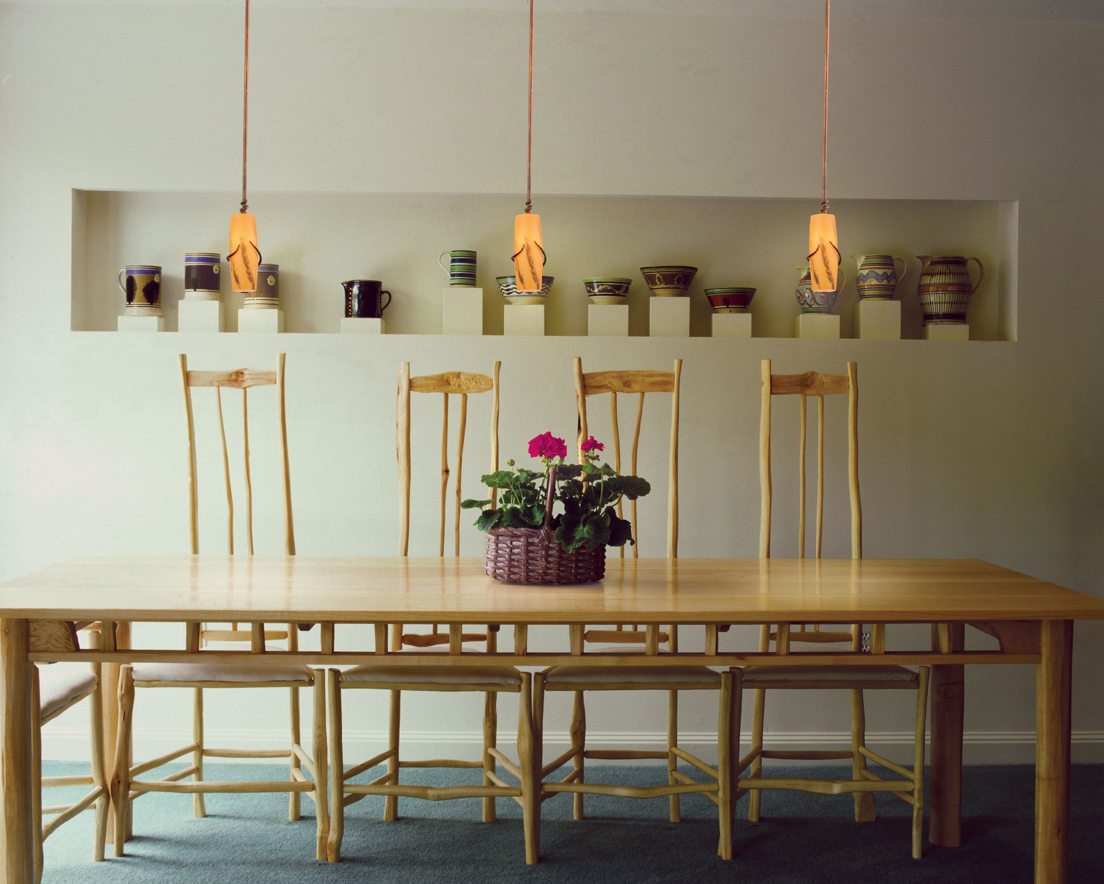 Add pendant lighting above a dining room table for added height and