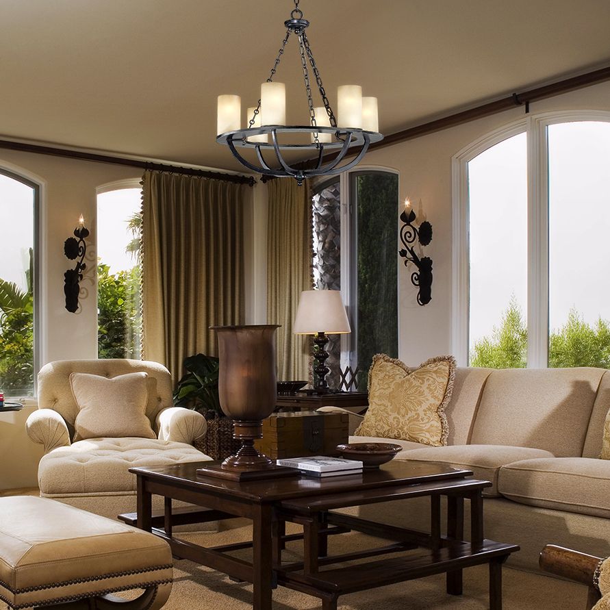 Use ceiling lighting to help define the space of a seating area. Lamps Plus