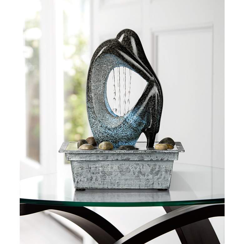 Modern Silhouette 10&quot; High LED Tabletop Fountain in scene