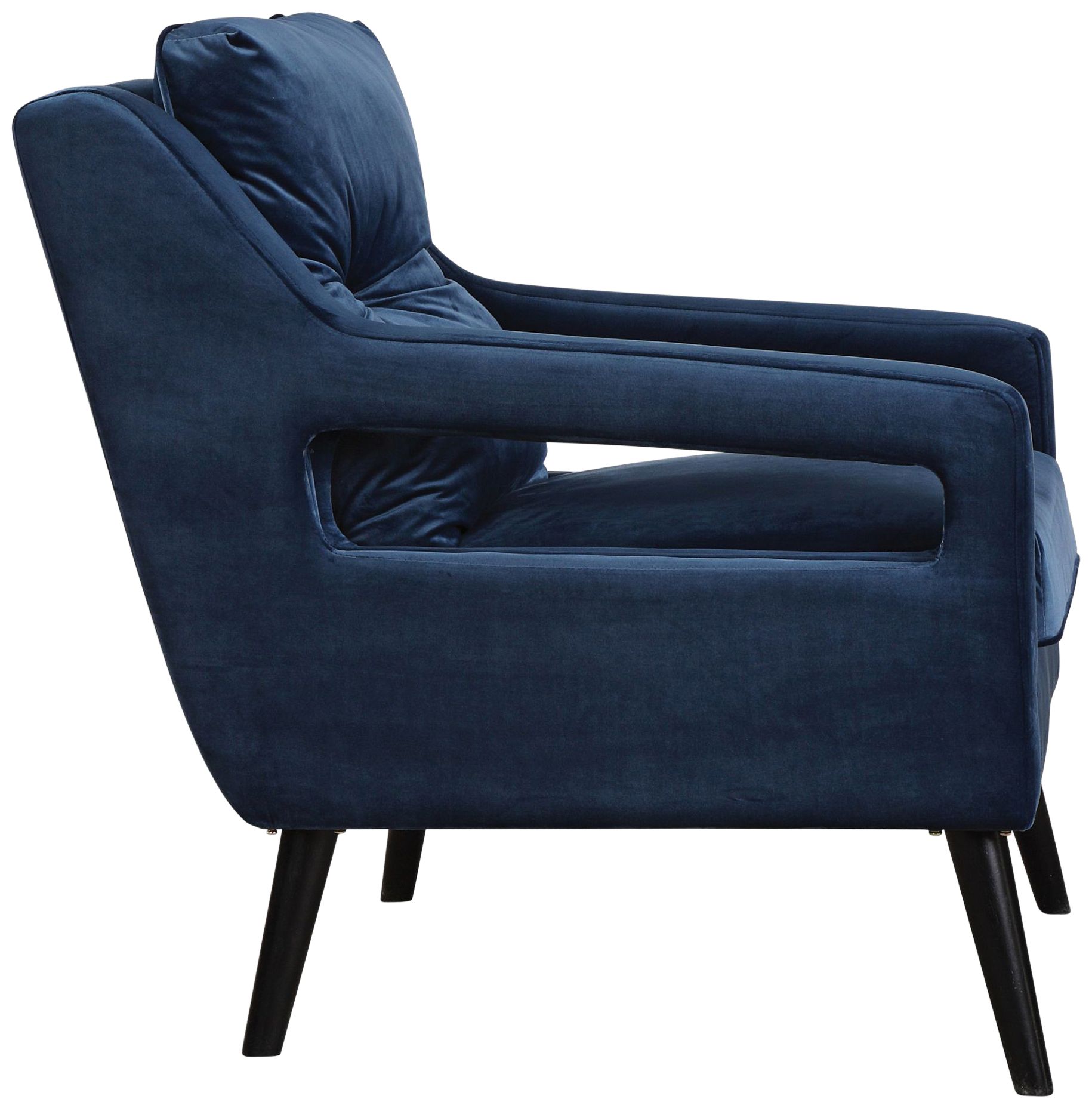 blue tufted armchair